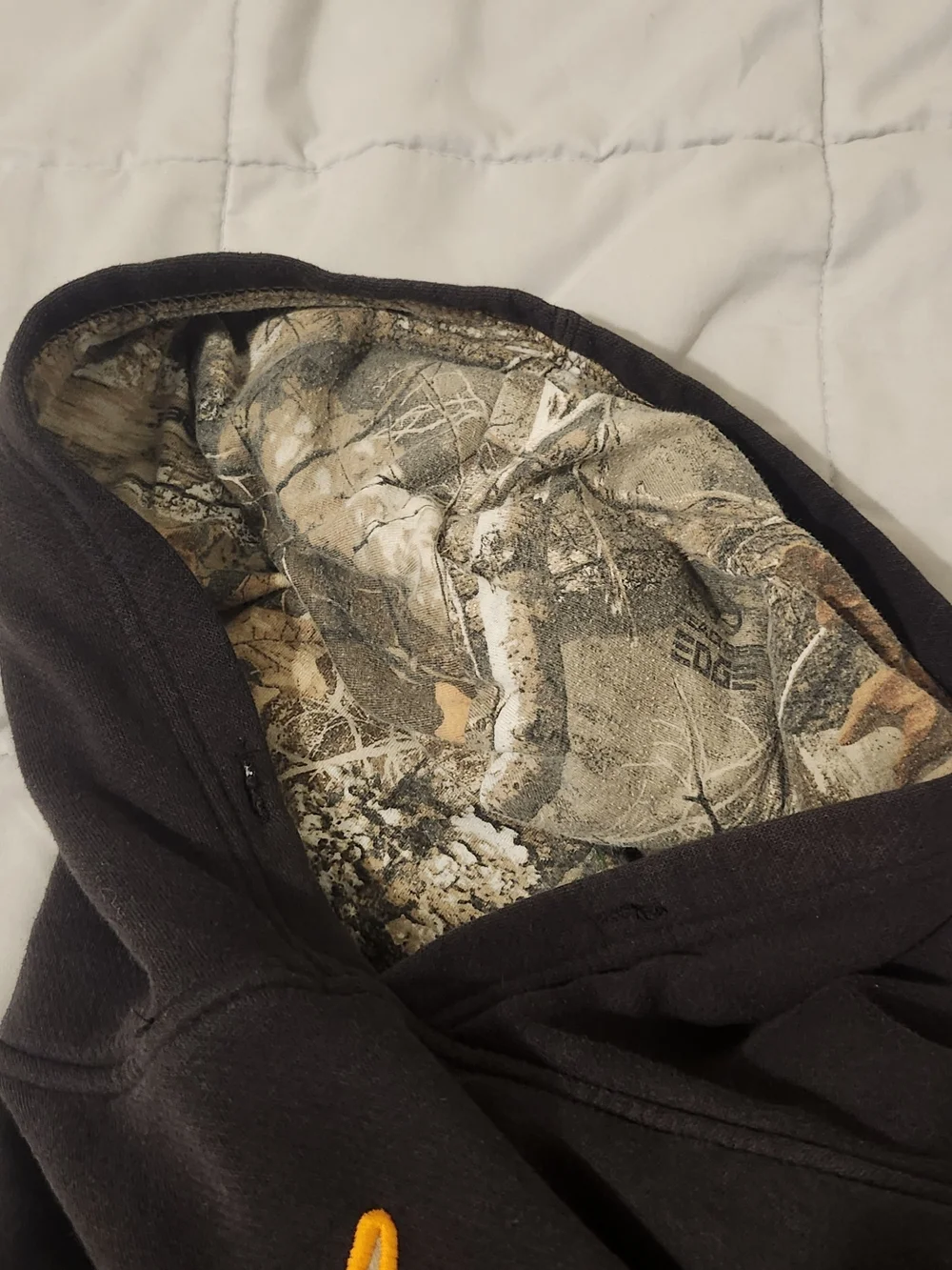Realtree Black Hoodie with Orange Logo and Camo Hood Trim